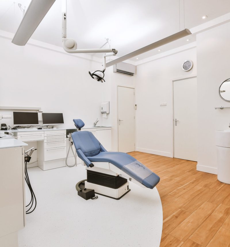Interior of modern dentist office Modern furniture and professional equipment located in light office of contemporary dental clinic